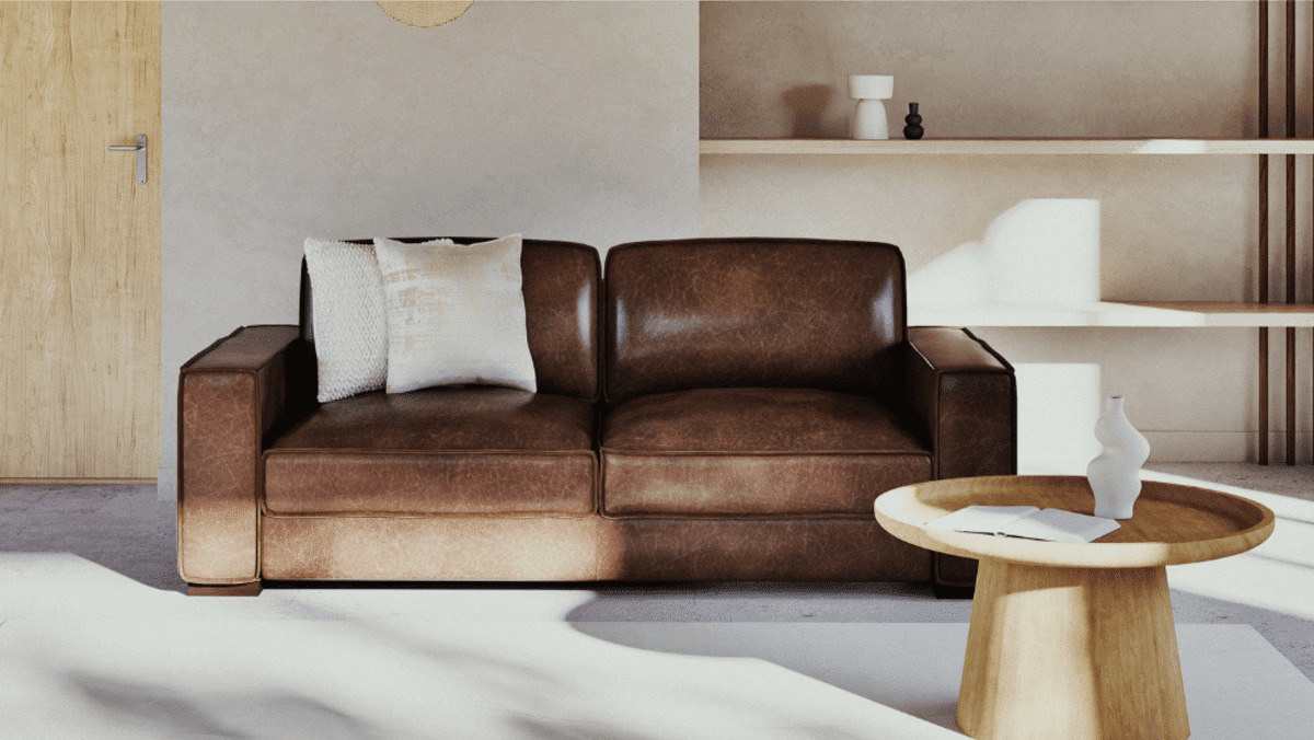 Un salon chaleureux avec un canapé en cuir marron