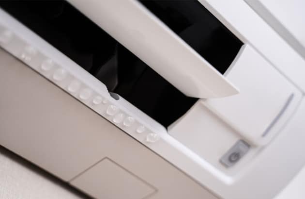 Climatiseur mal installé provoquant une fuite
